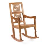 ROBERT THOMPSON OF KILBURN A MOUSEMAN OAK ROCKING CHAIR