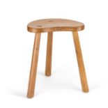 ROBERT THOMPSON OF KILBURN A MOUSEMAN OAK COW STOOL, CIRCA 1970
