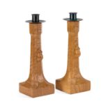 ROBERT THOMPSON OF KILBURN A PAIR OF MOUSEMAN OAK CANDLESTICKS