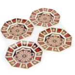 A SET OF FOUR ROYAL CROWN DERBY TEA PLATES