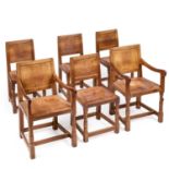 ROBERT THOMPSON OF KILBURN A SET OF SIX MOUSEMAN OAK PANEL-BACK DINING CHAIRS, CIRCA 1950