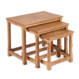 ROBERT THOMPSON OF KILBURN A NEST OF THREE MOUSEMAN OAK TABLES