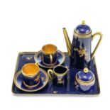 A LIMOGES PORCELAIN CABARET SET