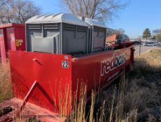 15 cubic yard dumpster with two porta potties and little pieces in the back