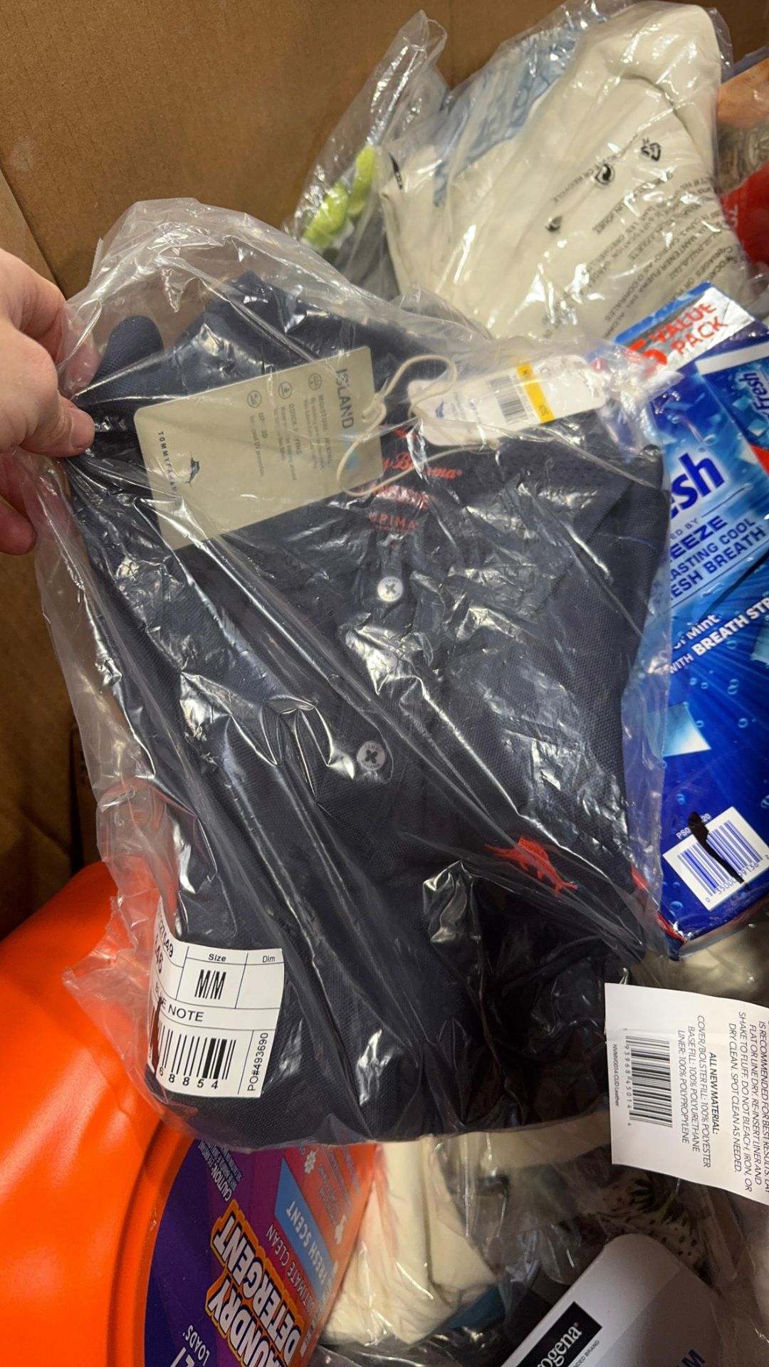 Big box store in a box: detergent, clothing, parchment paper, finish ...