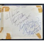 An Autograph book containing the signatures of THE WHO band members ROGER DALTRY, KEITH MOON, and
