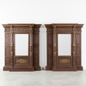 A Pair of Display Cabinets, decorated with Lion Heads and Pilasters, Sculptured and Patinated Wood,