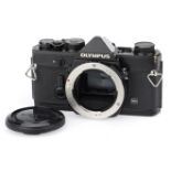 An Olympus OM-1N 35mm SLR Camera Body,