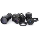 A Minolta X-500 35mm SLR Camera Outfit.