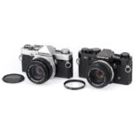 A Pair of Olympus OM-series 35mm SLR Cameras,