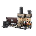 An Olympus OM-1 Camera Outfit,