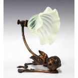 W.A.S. BENSON (1854-1924), an Arts & Crafts copper table lamp with vaseline green glass shade,
