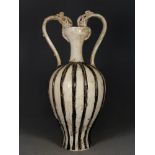 A double-dragon vase from the Ding kiln of the Song Dynasty, bearing the inscription "Shangshiju" (I
