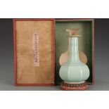 Formerly in the collection of a Song Dynasty Longquan celadon-glazed octagonal vase with gold-inlaid