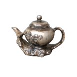 Silver high-relief plum blossom teapot made during the Qianlong period