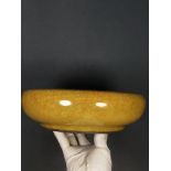 A large brush washer with a yellow glaze and ice-crack pattern, made of official porcelain from the