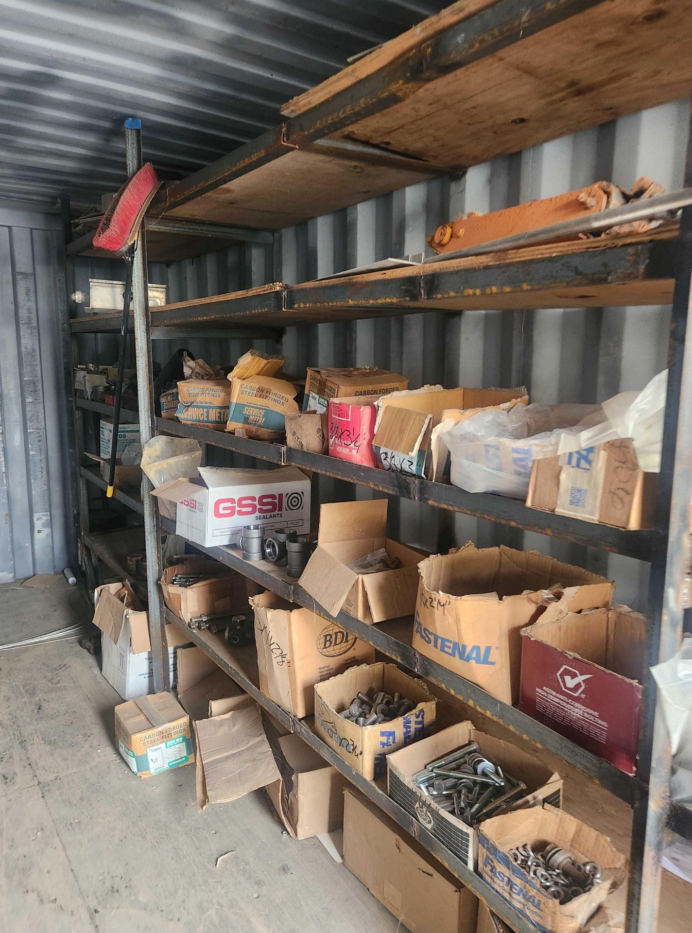 Container Catalog Shipping container 20' long x 8' wide. Contents Included.