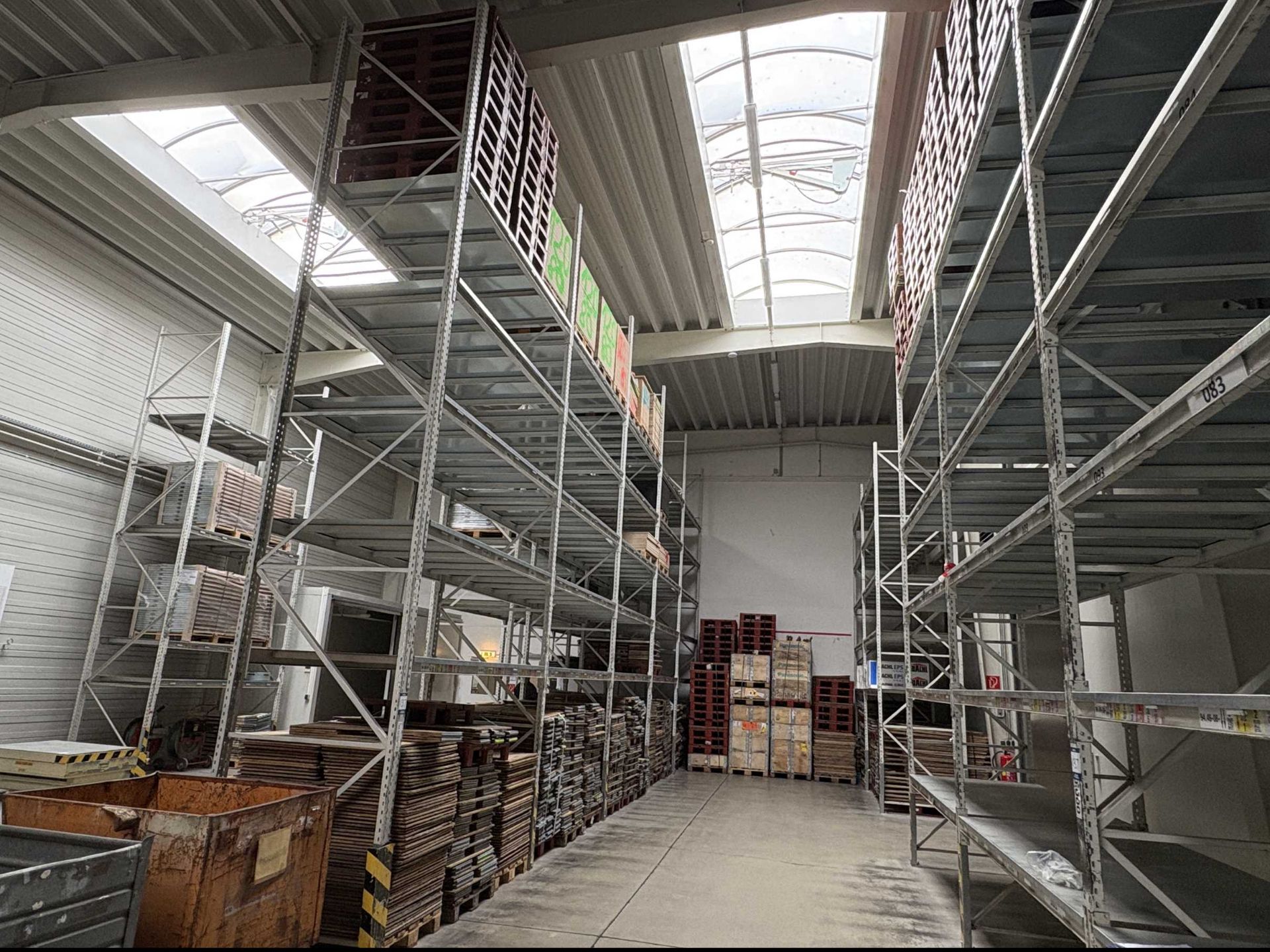 17 bays of boltless steel pallet racking. 5m high uprights, 2.7m ...