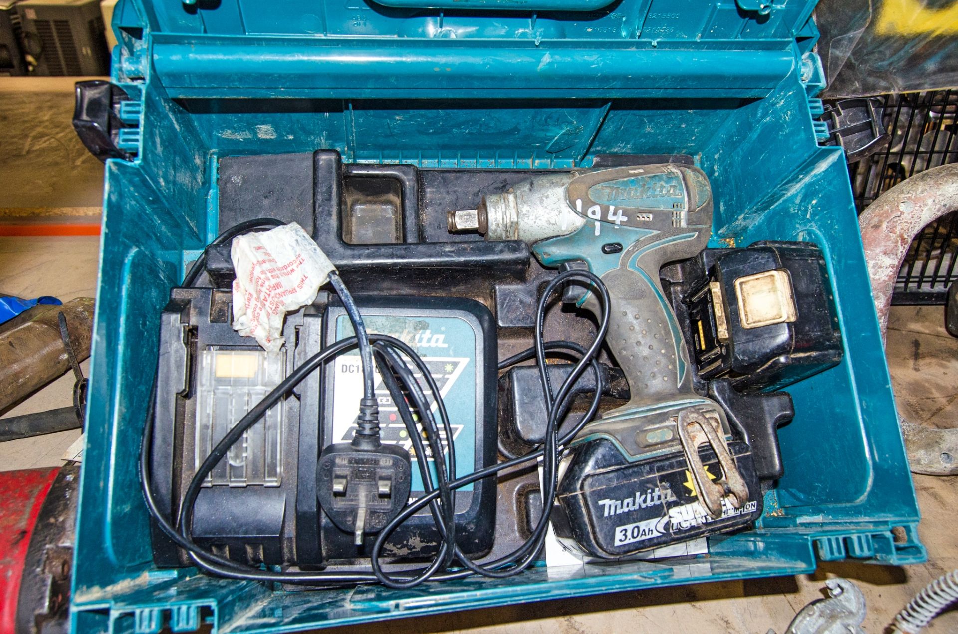 Makita 110v 1/2 inch drive impact gun c/w 2 - batteries, charger and carry case A983127