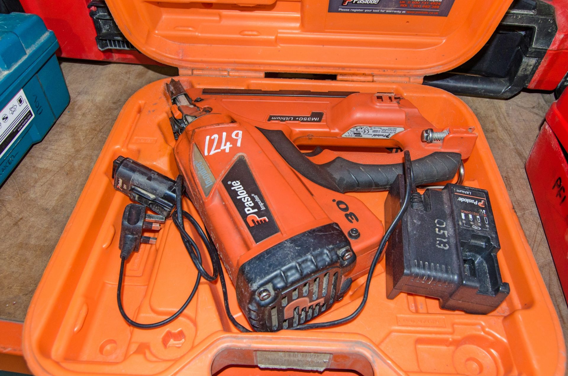 Paslode IM350 cordless nail gun c/w battery, charger and carry case