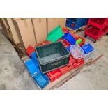 Pallet of various storage bins