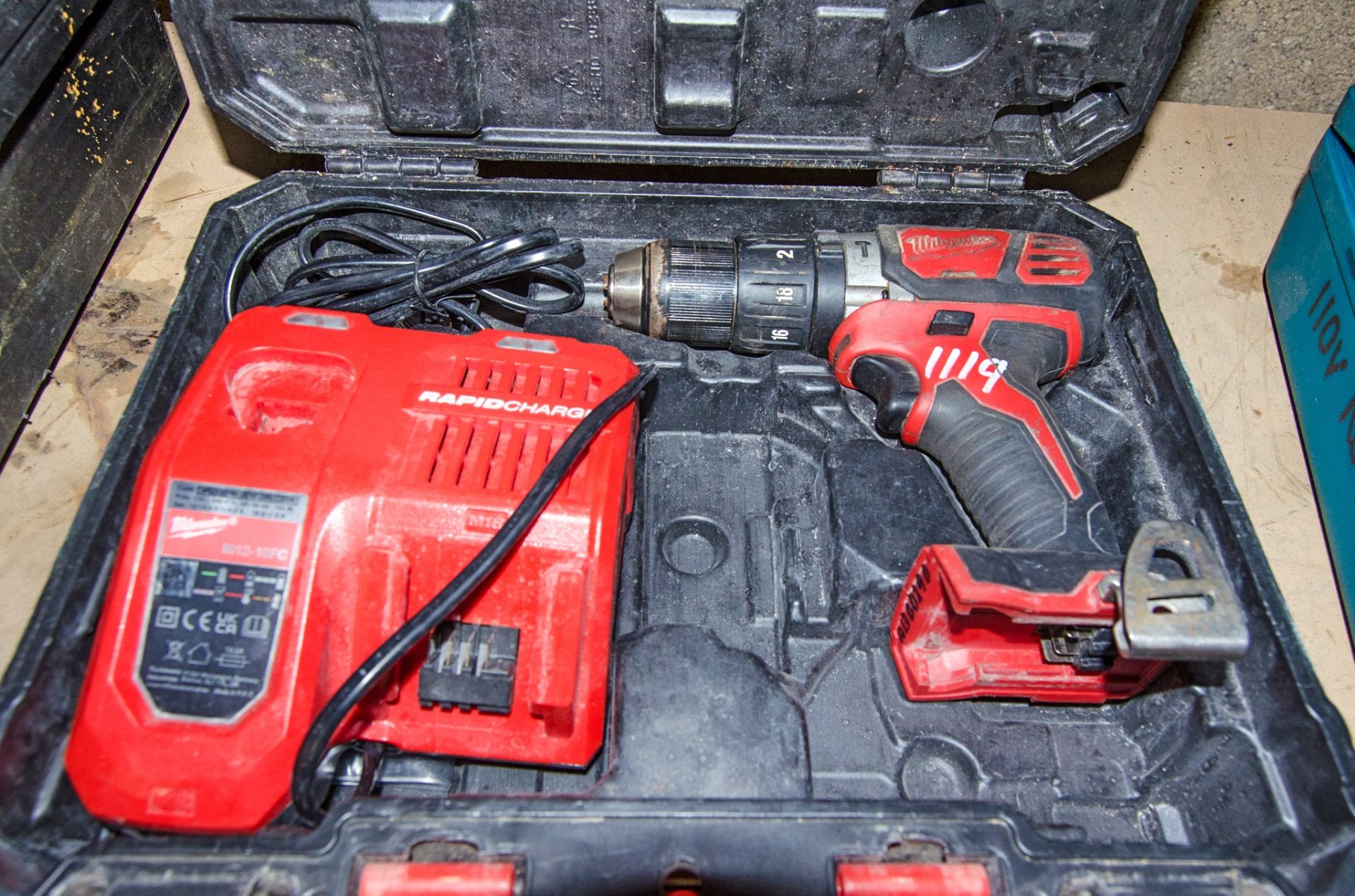 Milwaukee 18v cordless power drill c/w charger and carry case ** No battery ** AS6987