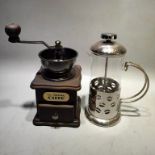 Old-fashioned hand-crank coffee machine