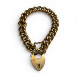 A hollow link precious yellow metal charm bracelet. With a heart padlock clasp, engraved with the