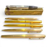 A collection of pens to include a Ronson propelling pencil lighter. Also to include a rolled gold
