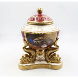 A French porcelain late 19th century porcelain pot pourri and pierced cover, claret ground with a
