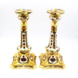 A pair of Royal Crown Derby Candlesticks in the 1128 Imari pattern, approximate height 26cm , both