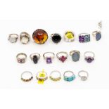A collection of twenty silver stone set dress rings, comprising various styles and types of stone,