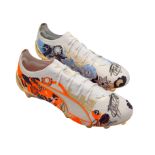 Football: a boxed pair of Memphis Depay PUMA football boots, made when he became the Netherlands