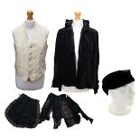 A black velvet pillbox designed hat with satin bow at back; a Harrods black velvet late Edwardian