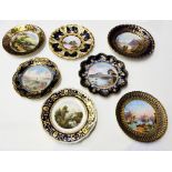 A collection of 19th and 20th Century porcelain decorative plates to include early 19th Century