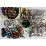 A collection of costume jewellery to include cultured pearl necklaces, amber bead necklace, beaded