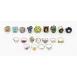 A collection of twenty silver stone set dress rings, comprising various styles and types of stone,