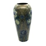Moorcroft pottery Late Florian ware design vase of slender ovoid form, c1916 /18 height approx 31cm.