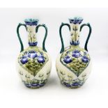 William Moorcroft for James Macintyre & Co - Pair of twin handled vases decorated with Poppies and