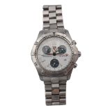 A Tag Heuer Professional stainless steel wristwatch, with a signed white enamel dial, three