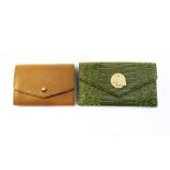 A Smythson Marshall travel wallet in croc embossed green leather with gold tone hardware and a