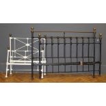 An early 20th century cast iron and tubular brass 5' bed frame with side rails and a Laura Ashley 2'