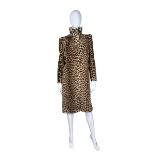 A later 1930s, leopard fur coat with puffed shoulders. The collar can be worn up or down and there