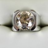 An Impressive Platinum and Light Brown 10.2ct Diamond ring