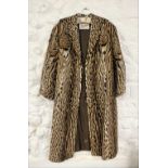OCELOT FUR COAT BY BRAHAM, NORWICH AND LONDON A mid-20th century ocelot fur coat by Braham,