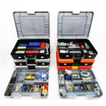 A collection of six Meccano plastic carry cases, five of which containing a collection of assorted