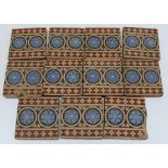Eleven Minton encaustic Gothic Revival tiles, each 15cm x 15cm