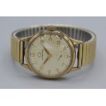 A circa 1960 gentleman's Garrard 9 carat gold cased presentation wristwatch. Seventeen jewel