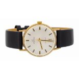Garrard- a gentleman's 9ct gold automatic wristwatch, comprising a silvered signed dial with applied