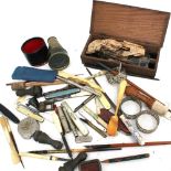 A mixed collection of ink pens, pen of fruit knives, bone instruments, pocket telescope, letter